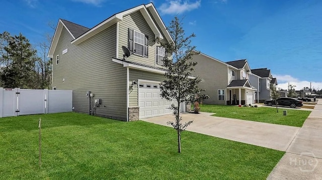 1207 Cypress Fall Cir, Hinesville, GA 31313 - view of property exterior with an attached garage, driveway, and a gate