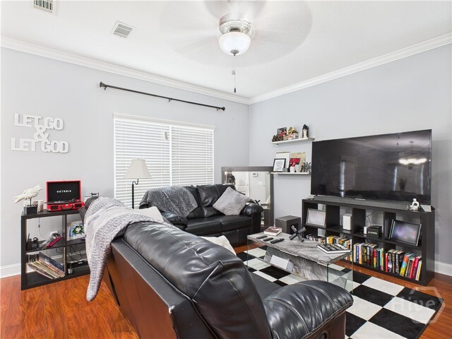 1207 Cypress Fall Cir, Hinesville, GA 31313 - living room with wood finished floors, a ceiling fan, and ornamental molding