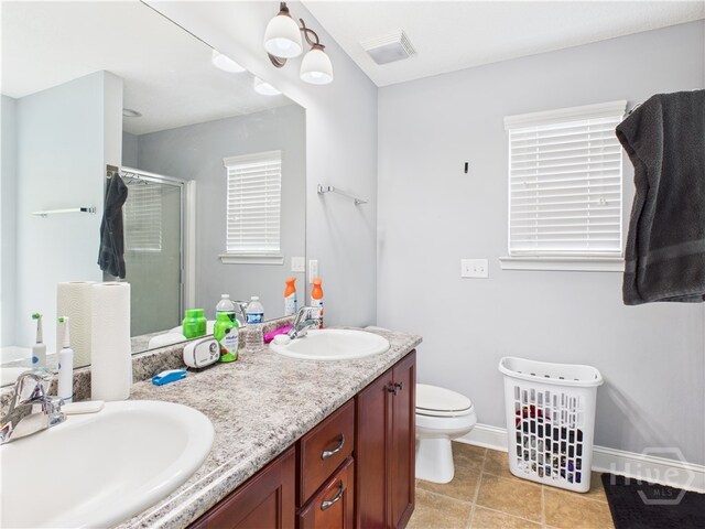 1207 Cypress Fall Cir, Hinesville, GA 31313 - full bathroom featuring a stall shower, double vanity, and tile patterned flooring