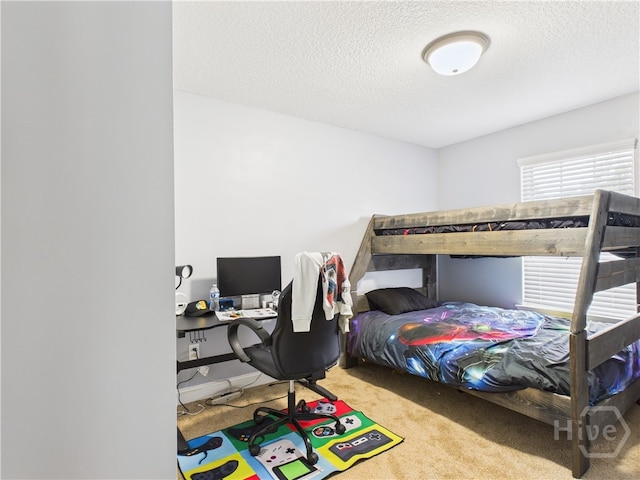1207 Cypress Fall Cir, Hinesville, GA 31313 - bedroom featuring carpet floors, a desk, and a textured ceiling