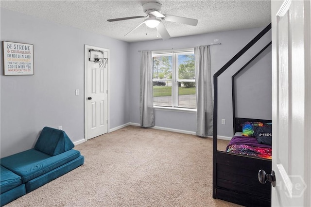 65 Fabian Ln, Hinesville, GA 31313 - carpeted bedroom with a textured ceiling and a ceiling fan