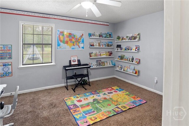 65 Fabian Ln, Hinesville, GA 31313 - game room featuring carpet flooring, a textured ceiling, and a ceiling fan