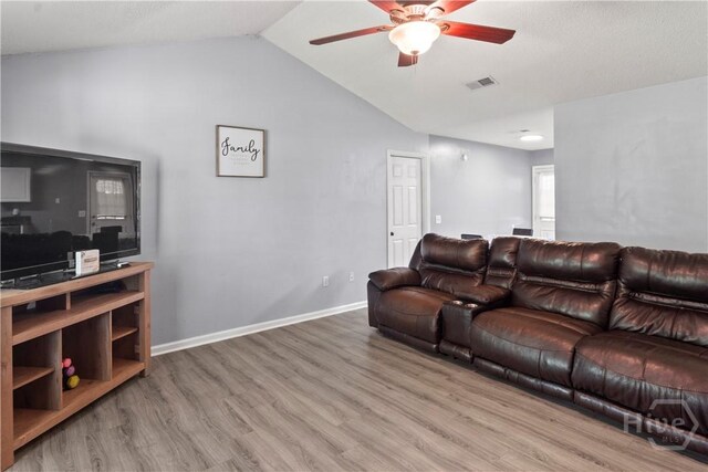 65 Fabian Ln, Hinesville, GA 31313 - living area featuring ceiling fan, wood finished floors, and lofted ceiling