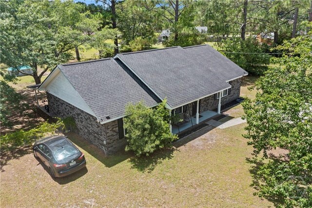 65 Fabian Ln, Hinesville, GA 31313 - aerial view of property and surrounding area featuring a tree filled landscape