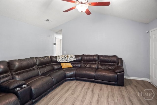 65 Fabian Ln, Hinesville, GA 31313 - living room with a ceiling fan, wood finished floors, and vaulted ceiling
