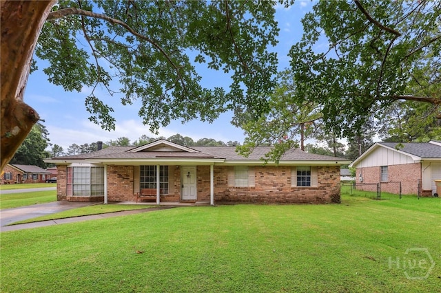 101 Greene Dr, Rincon, GA 31326 - ranch-style home featuring brick siding and a porch