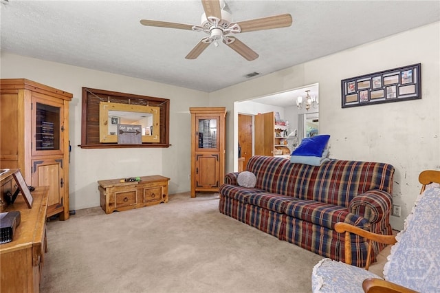 101 Greene Dr, Rincon, GA 31326 - carpeted living area featuring a ceiling fan and a chandelier