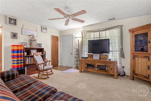 101 Greene Dr, Rincon, GA 31326 - living area with carpet, a textured ceiling, and ceiling fan