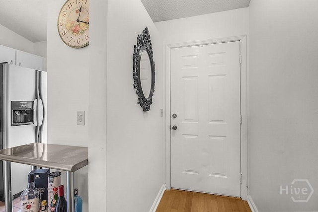 104 Shoals Dr Unit L8, Savannah, GA 31410 - doorway featuring light wood-style flooring and baseboards