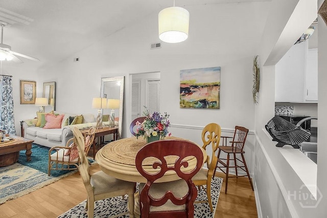 104 Shoals Dr Unit L8, Savannah, GA 31410 - dining space with a ceiling fan, lofted ceiling, and light wood-style flooring