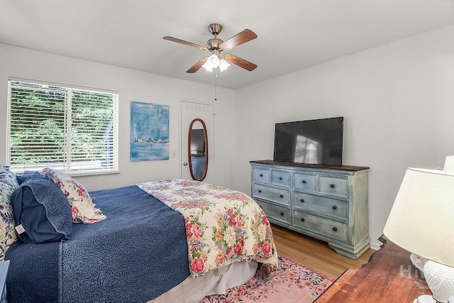 104 Shoals Dr Unit L8, Savannah, GA 31410 - bedroom with wood finished floors and ceiling fan