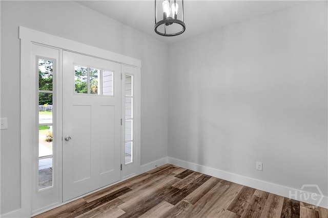 222 N Skinner Ave, Pooler, GA 31322 - entryway featuring a chandelier and wood finished floors