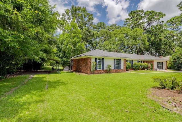 322 Suncrest Blvd, Savannah, GA 31410 - view of front of house featuring brick siding and a front lawn