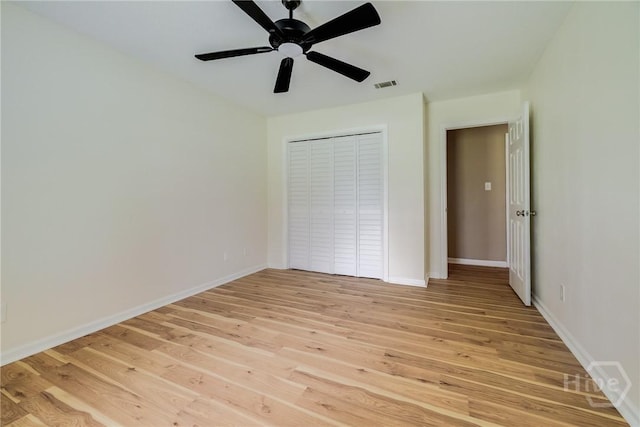 322 Suncrest Blvd, Savannah, GA 31410 - unfurnished bedroom featuring light wood-style floors, ceiling fan, and a closet