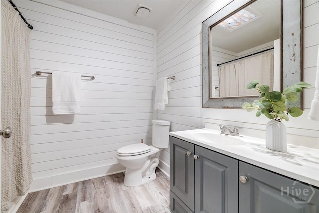 322 Suncrest Blvd, Savannah, GA 31410 - full bath featuring wood walls, vanity, and wood finished floors