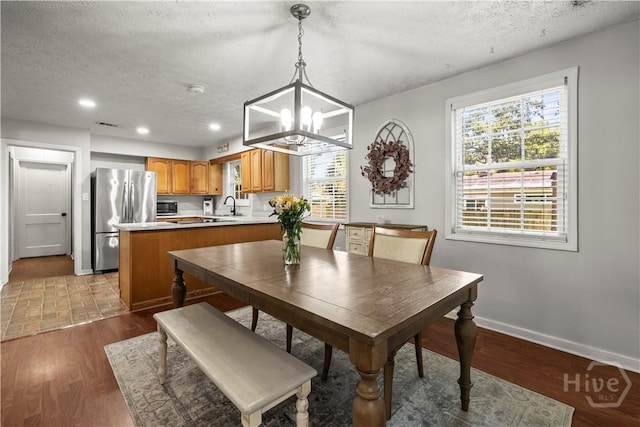 1001 Debbie St, Savannah, GA 31410 - dining space featuring a textured ceiling, a chandelier, healthy amount of natural light, wood finished floors, and recessed lighting