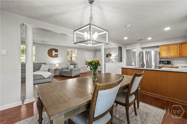 1001 Debbie St, Savannah, GA 31410 - dining area with a textured ceiling, dark wood-style flooring, recessed lighting, and a chandelier