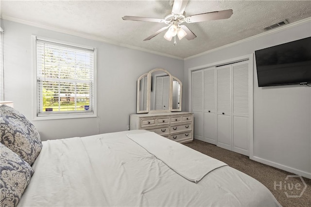1001 Debbie St, Savannah, GA 31410 - carpeted bedroom with a closet, ornamental molding, a textured ceiling, and a ceiling fan