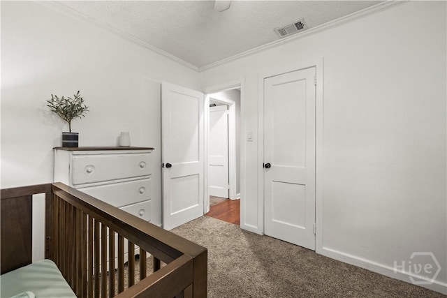 1001 Debbie St, Savannah, GA 31410 - carpeted bedroom with ornamental molding and a textured ceiling