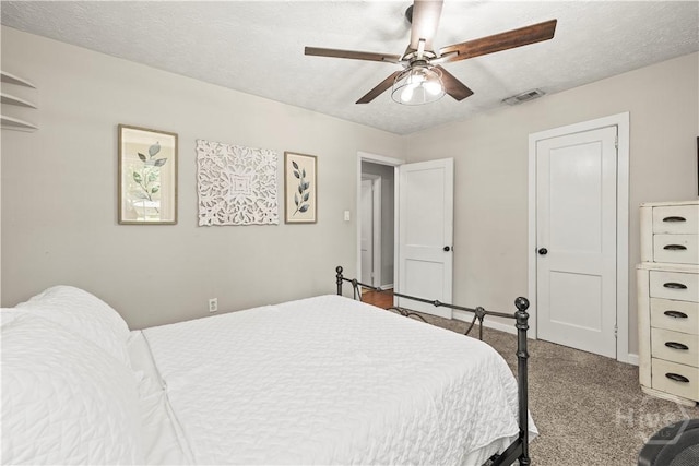 1001 Debbie St, Savannah, GA 31410 - bedroom with carpet floors, a ceiling fan, and a textured ceiling