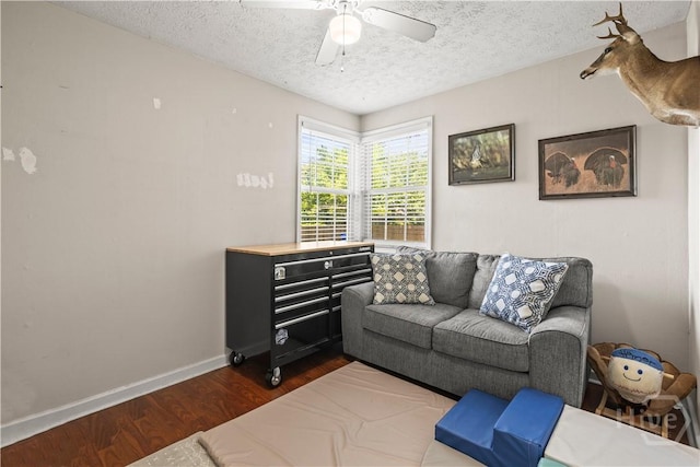 1001 Debbie St, Savannah, GA 31410 - living room with wood finished floors, a textured ceiling, and a ceiling fan