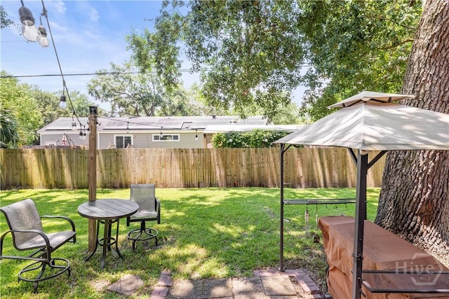 1001 Debbie St, Savannah, GA 31410 - fenced backyard with a gazebo