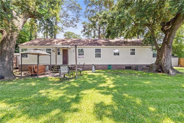 1001 Debbie St, Savannah, GA 31410 - back of house with a lawn and crawl space