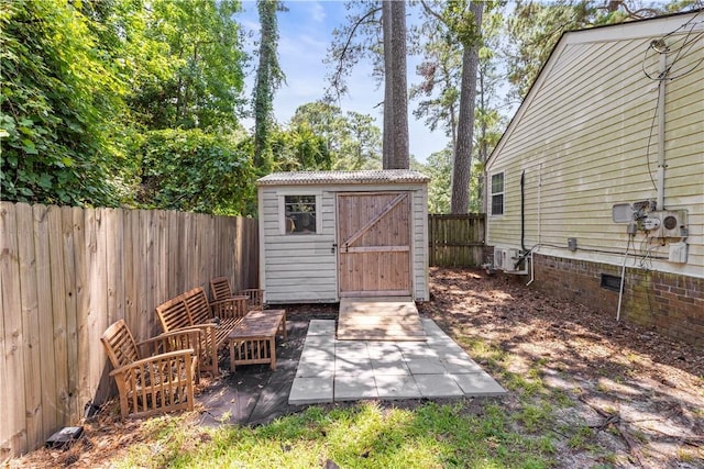 1001 Debbie St, Savannah, GA 31410 - view of shed featuring a fenced backyard