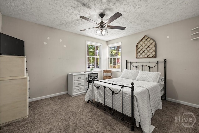 1001 Debbie St, Savannah, GA 31410 - carpeted bedroom with a textured ceiling and a ceiling fan