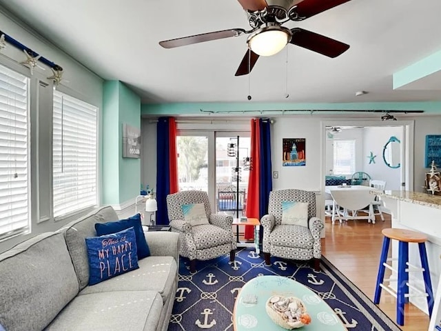 1415 Butler Ave Unit 1, Tybee Island, GA 31328 - living room with wood finished floors and a ceiling fan