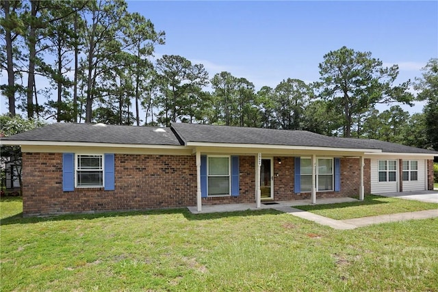 13609 Rockingham Ct, Savannah, GA 31419 - ranch-style house with a front yard and brick siding