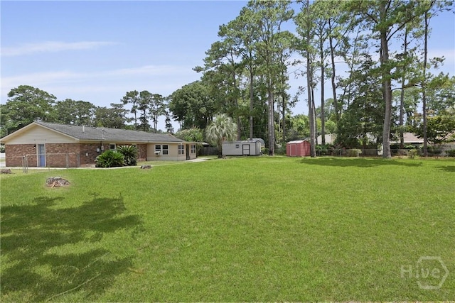 13609 Rockingham Ct, Savannah, GA 31419 - view of yard featuring a storage shed