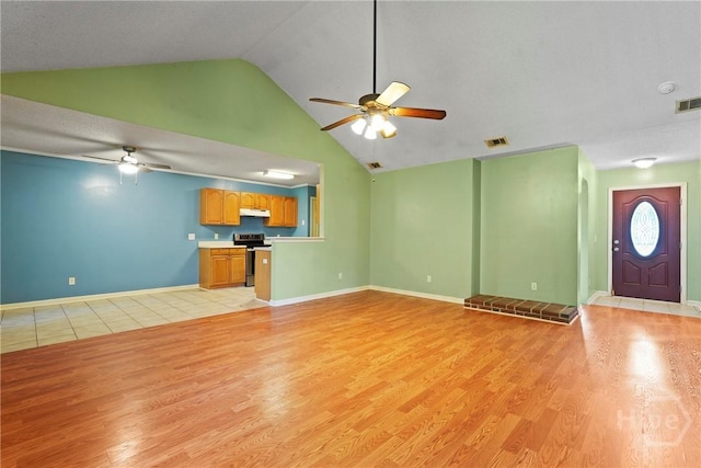 11 Gilliam Ave, Savannah, GA 31406 - unfurnished living room featuring ceiling fan, light wood-type flooring, and high vaulted ceiling