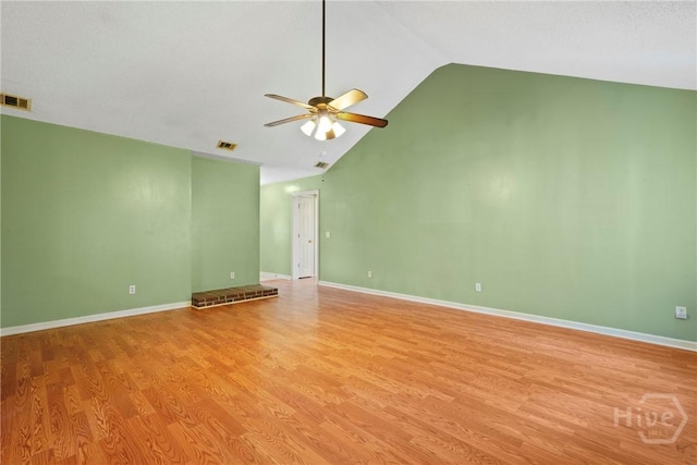 11 Gilliam Ave, Savannah, GA 31406 - spare room with ceiling fan, light wood-type flooring, and high vaulted ceiling