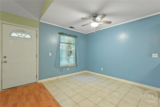 11 Gilliam Ave, Savannah, GA 31406 - entrance foyer featuring a ceiling fan, ornamental molding, and a textured ceiling
