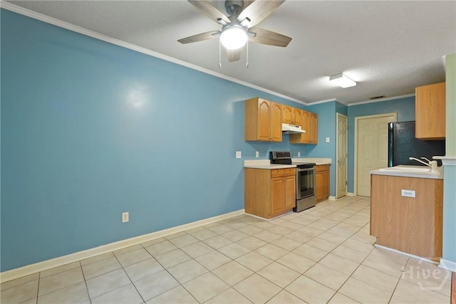 11 Gilliam Ave, Savannah, GA 31406 - kitchen featuring stainless steel range with electric stovetop, freestanding refrigerator, light countertops, a ceiling fan, and under cabinet range hood