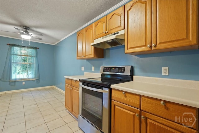 11 Gilliam Ave, Savannah, GA 31406 - kitchen with under cabinet range hood, stainless steel range with electric stovetop, a textured ceiling, crown molding, and light countertops