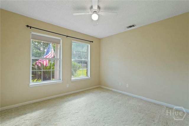 11 Gilliam Ave, Savannah, GA 31406 - carpeted spare room featuring a textured ceiling and a ceiling fan