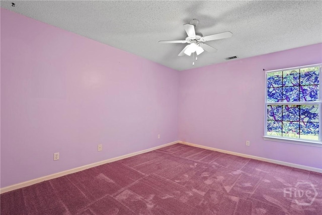 11 Gilliam Ave, Savannah, GA 31406 - carpeted empty room with ceiling fan and a textured ceiling