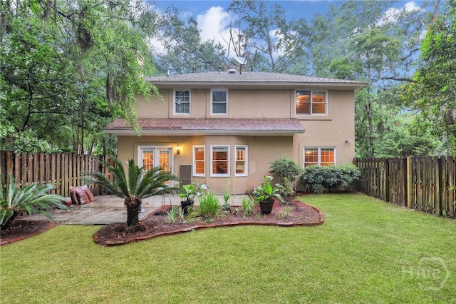 123 Companion Way, Savannah, GA 31419 - back of house with stucco siding, a fenced backyard, and a patio area