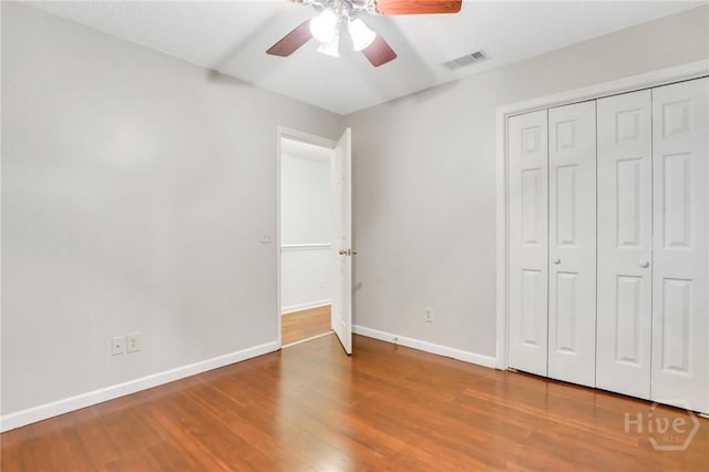 123 Companion Way, Savannah, GA 31419 - unfurnished bedroom with wood finished floors, a closet, and ceiling fan