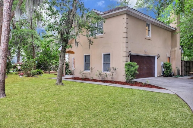 123 Companion Way, Savannah, GA 31419 - view of front facade featuring an attached garage, stucco siding, driveway, and a front yard
