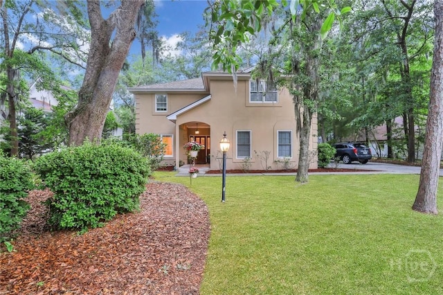 123 Companion Way, Savannah, GA 31419 - view of front facade featuring stucco siding and a front yard