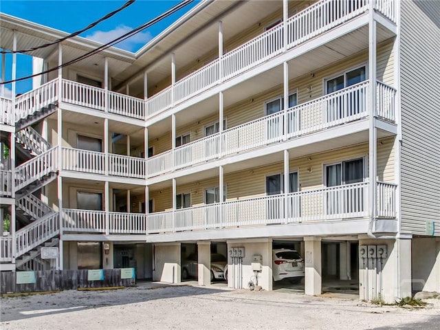 8 Silver Ave Unit 9, Tybee Island, GA 31328 - view of apartment building / complex with stairway