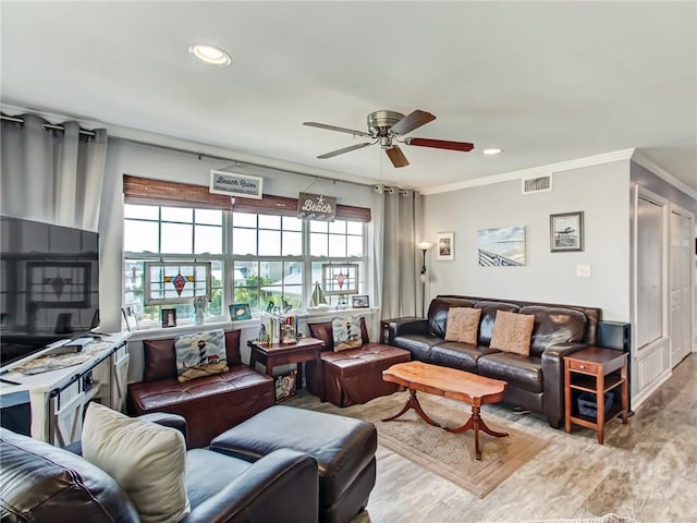8 Silver Ave Unit 9, Tybee Island, GA 31328 - living area with a ceiling fan, ornamental molding, wood finished floors, and recessed lighting