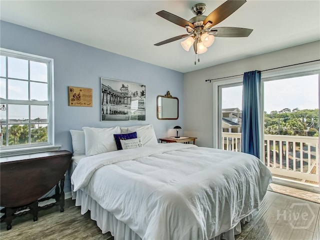 8 Silver Ave Unit 9, Tybee Island, GA 31328 - bedroom featuring access to outside, wood finished floors, and a ceiling fan