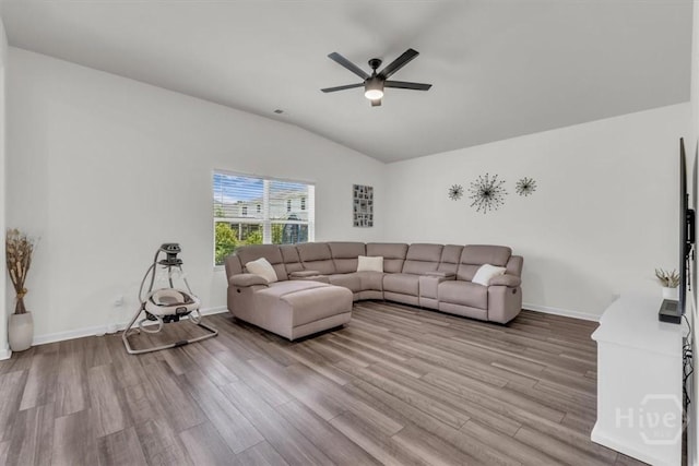 105 Jepson Way, Pooler, GA 31322 - living room featuring vaulted ceiling, wood finished floors, and a ceiling fan