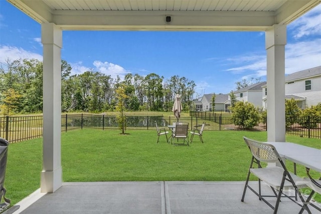 105 Jepson Way, Pooler, GA 31322 - fenced backyard featuring a patio, outdoor dining area, and a residential view