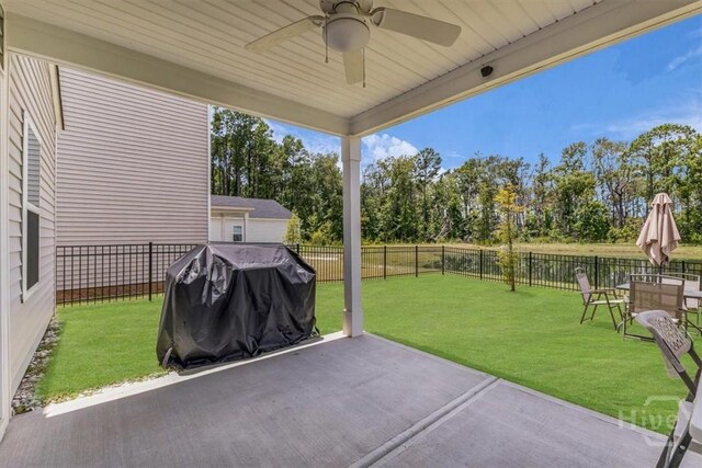105 Jepson Way, Pooler, GA 31322 - fenced backyard with a ceiling fan, a grill, a patio area, and view of scattered trees