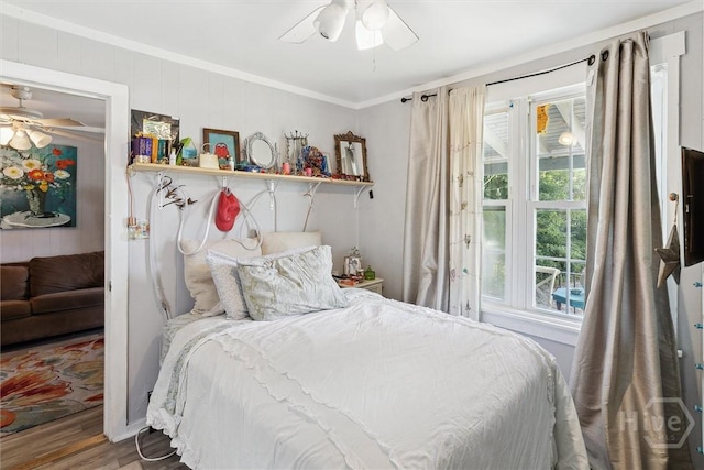 122 W 61st St, Savannah, GA 31405 - bedroom with ornamental molding, wood finished floors, and a ceiling fan